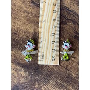 Set of two small vintage clown brooch pins